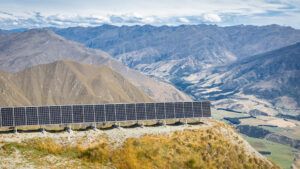 photovoltaic solar panels on the slope above valley in Mount Aspiring National Park, South Island, New Zealand
